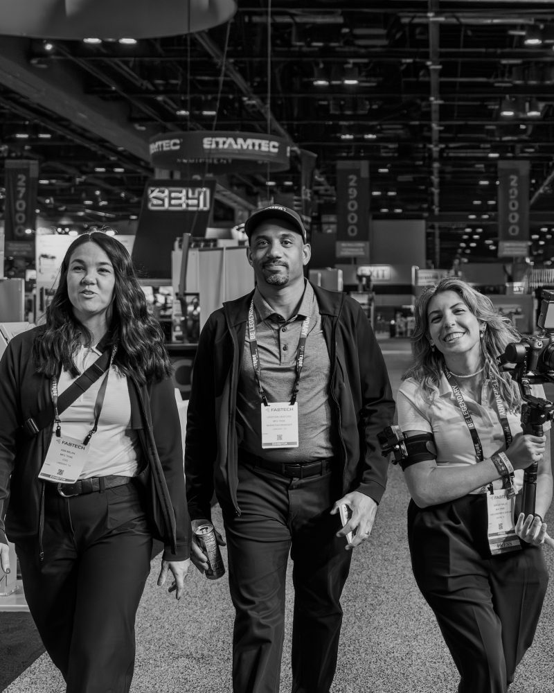 Employees of Milan Media attending a trade show with our successful videographer