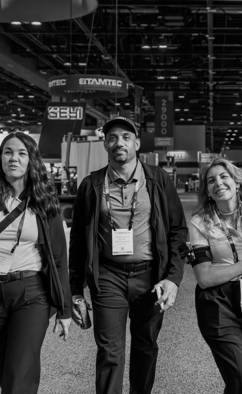 Employees of Milan Media attending a trade show with our successful videographer