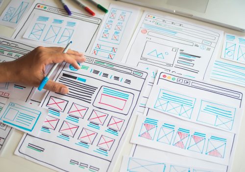 Website designer Creative planning application developer development draft sketch drawing template layout prototype framework wireframe design studio . User experience concept .